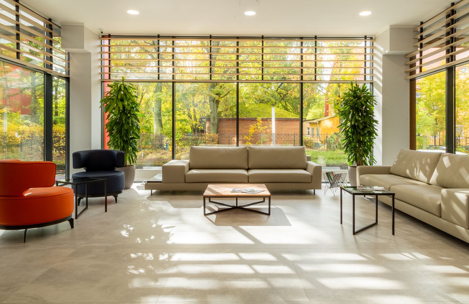 Bright modern living room with garden views